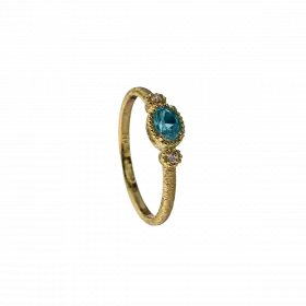 14k Gold Ring set with oval Blue Topaz and Diamond on either side