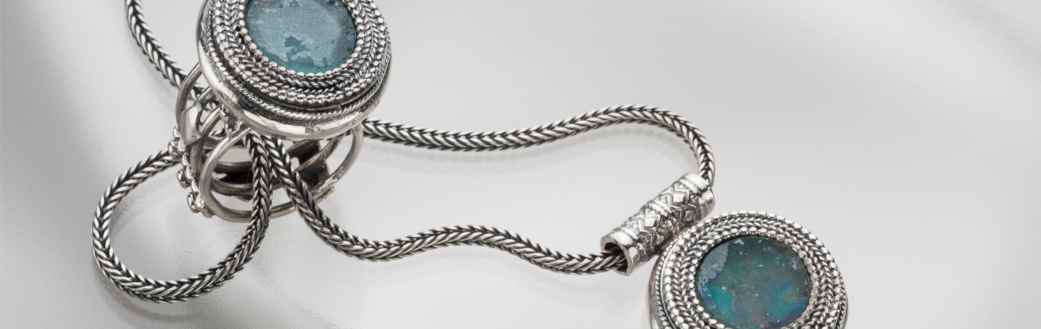 Silver jewelry with antique Roman glass, Roman glass, silver jewelry made of filigree, jewelry for women, silver jewelry in Israel, handmade jewelry, silver Roman glass ring, jewelry in Haifa, Roman glass, filigree work,summer jewelry, one-of-a-kind, Twis